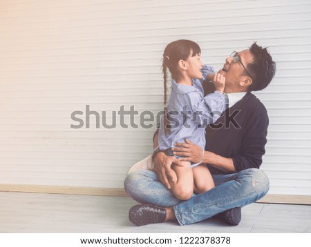happy family with father  and child playing together