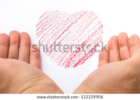 hands holding a heart sketch