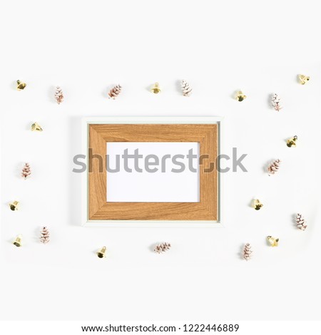 Festive composition of Christmas decorations on white background. Flat lay with copy space. New year holiday frame.