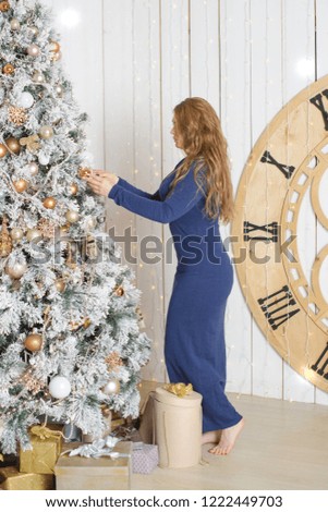 young girl in Christmas or new year decorations