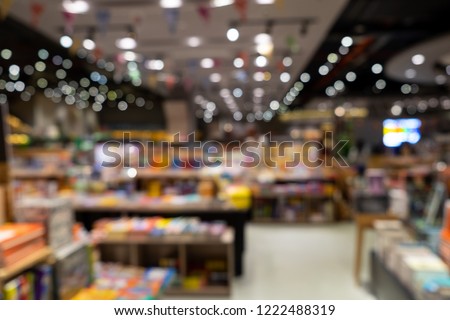 Blur scene from inside of a bookstore, can be used as a background for commercial