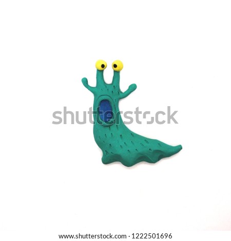 Blue slug with open mouth. Plasticine character on a white background Royalty-Free Stock Photo #1222501696