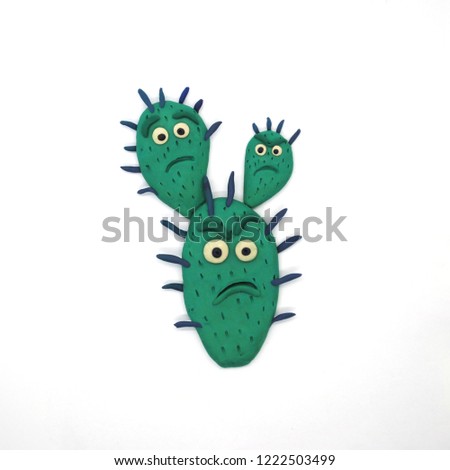 Angry cactus on a white background. Funny plasticine illustration Royalty-Free Stock Photo #1222503499