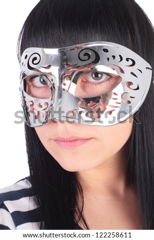 pretty young girl in the carnival mask closeup