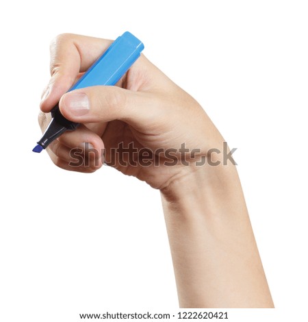 Hand holding a blue marker, isolated on white background