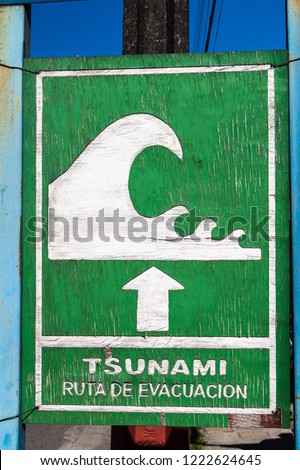 Tsunami Hazard Zone Sign in Curaco de Velez village, Chile