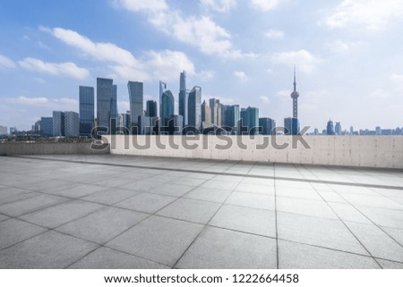 empty square with city skyline in shanghai china