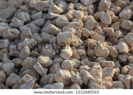 White gravel on a construction site as an abstract background .