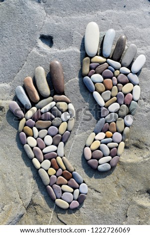 Human feet on the stone
