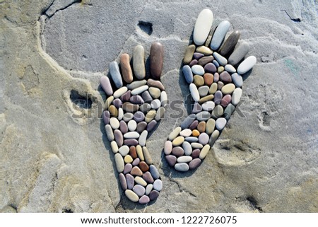 Human feet on the stone
