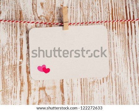 Card with  heart on wood, for your love message