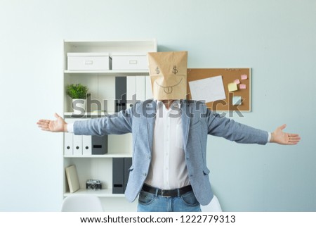 Business, emotions and money concept - office crazy man put a package with painted funny face on her head. Dollar sign in her eyes