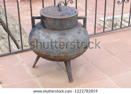 iron traditional cauldron close up outdoors