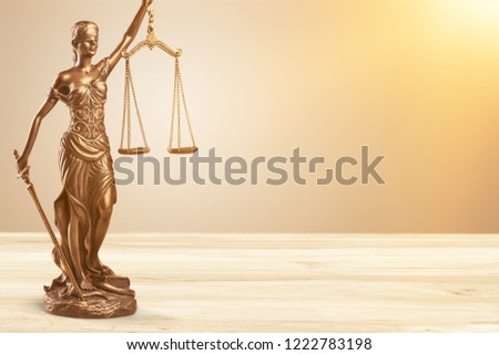 Justice Scales and books