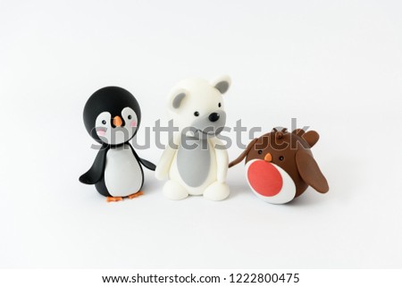 Cute Sugar Robin with a penguin and polar bear  isolated on a white background