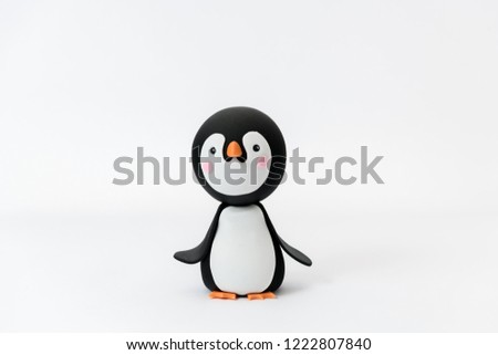 Cute sugar penguin isolated on a white background