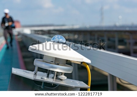 Pyranometer for measuring irradiance in solar farm with blue sky. Royalty-Free Stock Photo #1222817719