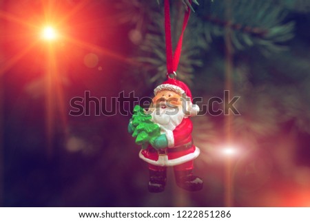 New Year and Christmas happy Santa Claus, fabulous picture with a Christmas tree.