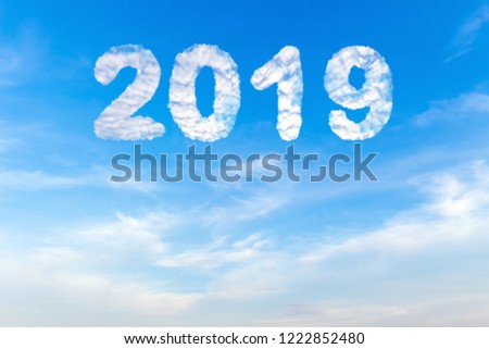 2019 New Year text blue sky background with white clouds.