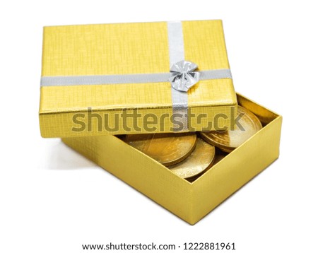 gold gift box with gold coins, isolated on white background