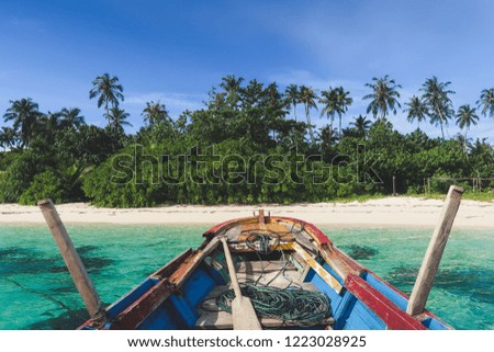 Boat arriving in remote Paradise - Banyak Islands in Indonesia