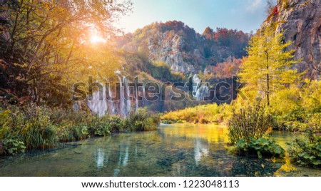 Attractive morning view of pure water waterfall in Plitvice National Park. Amazing autumn scene of Croatia, Europe. Abandoned places of Plitvice lakes series. Beauty of nature concept background.