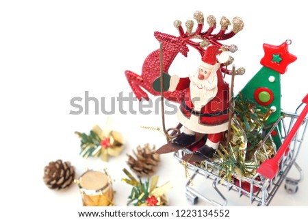 Merry Christmas with Santa Claus and a reindeer on a trolley / Year end sale concept                              