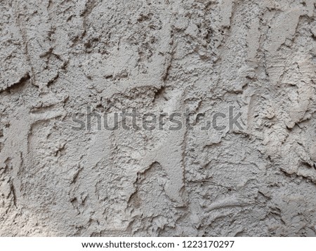 Old grey wall and rough, grunge concrete background with natural cement texture.