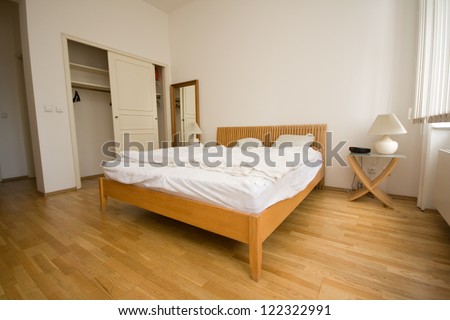 wooden bedroom Royalty-Free Stock Photo #122322991