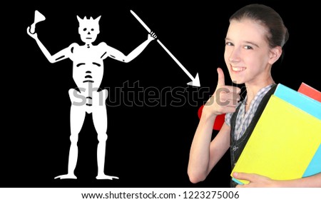 Happy young girl holding books, on the background of the flag of Blackbeard Pirate. The concept of language learning and study. Travels.