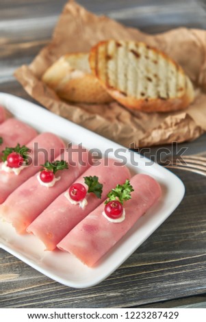 Ham roll ups stuffed with cheese, garlic and mayonnaise pic
