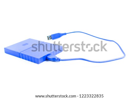 Close up of external hard disk drive for connect to laptop, transfer or backup data between computer and HDD. Blue hard disc for backup files and important information using USB 3.0 connection