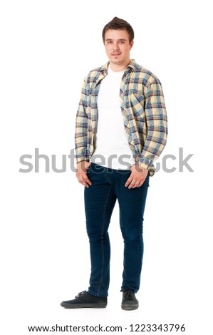 Full length portrait of a young modern man, isolated on white background