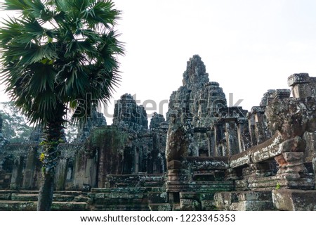 Angkor Thom, the last capital of the Khmer Empire. Bayon, the most notable temple at Angkor Thom.