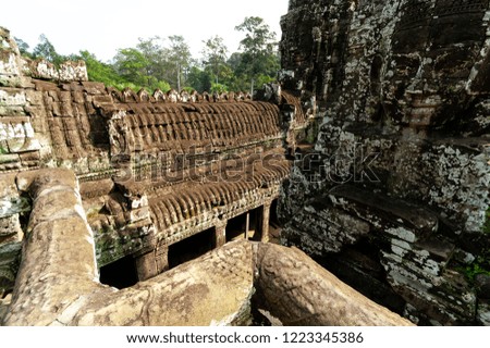 Angkor Thom, the last capital of the Khmer Empire. Bayon, the most notable temple at Angkor Thom.