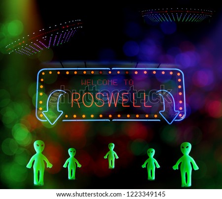 Welcome To Roswell Sign With UFO and Aliens