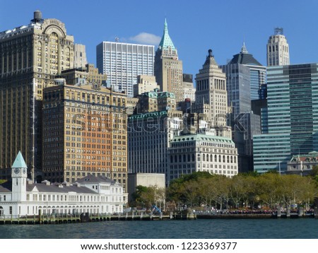 View of Manhattan buildings in New York City from the Hudson River. 