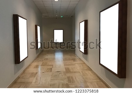 Multiple empty blank poster screens at a hallway ideal for digital kiosk visual  communication, billboard, information board, video wall, signage and  copy space