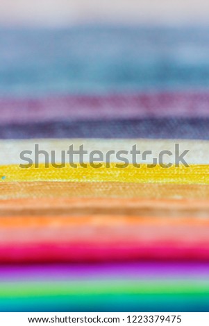 Samples of colorful interior fabrics. Selective focus. Vertical photography
