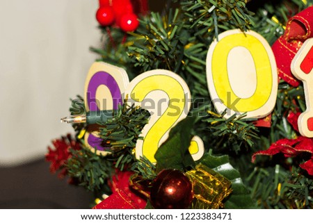 Christmas background with decorated tree and New Year Card
