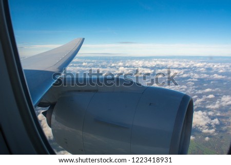Horizontal View of the Landscape Viewed From an Airplane on Blue Sky Background