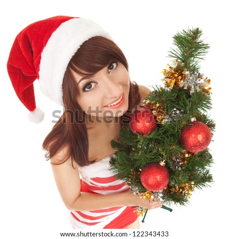 Santa woman with christmas tree. Wide angle
