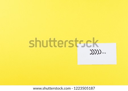 Smile on yellow background. Copy space.