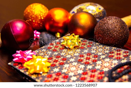 festive glitter christmas decoration with bauble  and gift wrap seasonal winter holidays