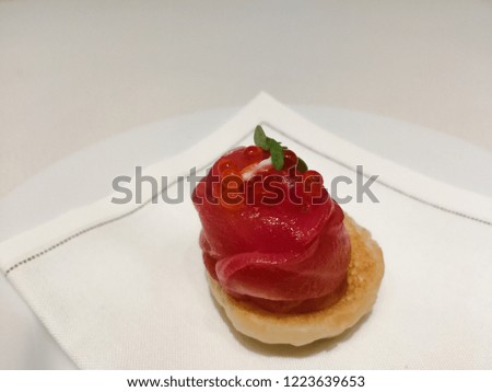 delicious smoked salmon on bagel canape on white background