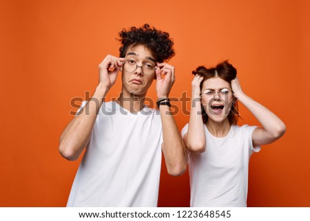 emotional man and woman with glasses                      