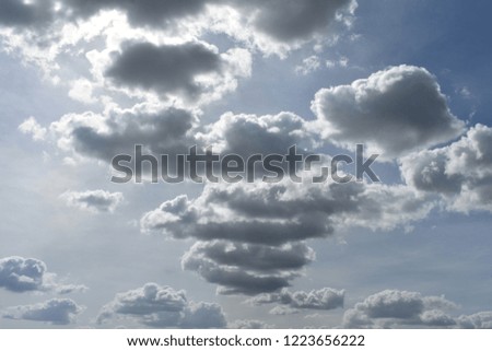 BLUE SKY WHITE CLOUDS AS BACKGROUND