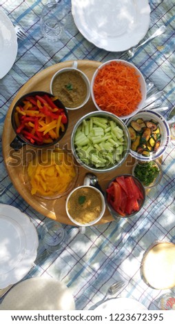The ingredients for summer rolls on a nicely set tray look colourful and mouthwatering. A simple and clean setup make this picture worthwile.
