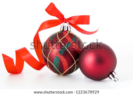 Christmas ball bauble decoration red New Year's Eve winter hanging adornment souvenir. Traditional ornament happy wintertime holidays Merry Xmas symbol closeup. photo