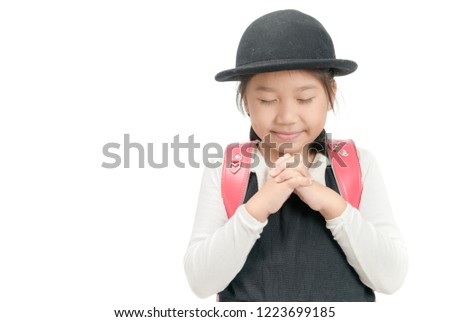 Asian girl praying isolated on white background. student asia hand pray. press the hands together at the chest or forehead in sign of respect. Faith spirituality and religion concept.